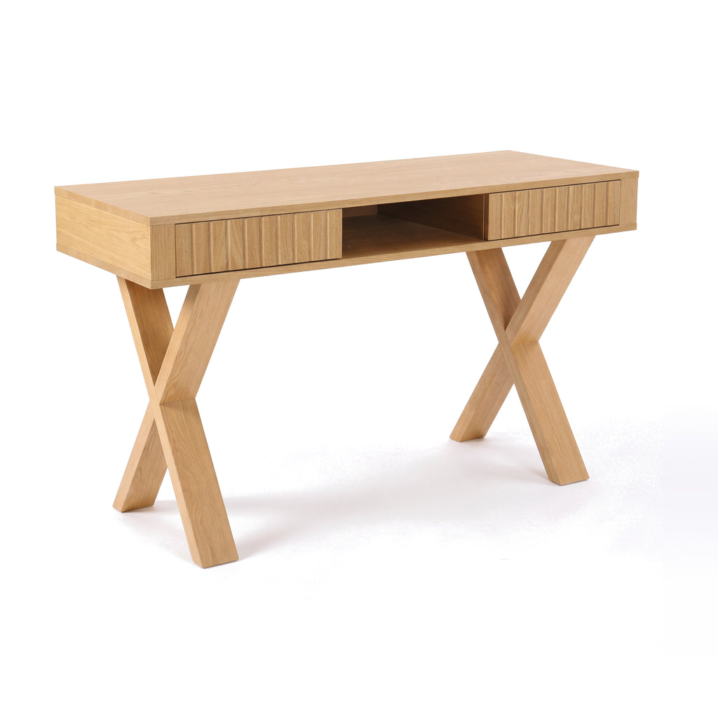 Arden 140cm Home Office Desk Natural, three-quarter view on a white background showing the crossed legs, two fluted drawer fronts and a centre open shelf