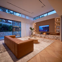 Atlantis 4 Seater Sofa Tan, styled in a living room beside the fireplace