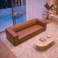 Atlantis 4 Seater Sofa Tan, styled in a living room, overhead view