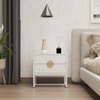 Cortez 2 Drawer Bedside Table White, beside a bed beneath a pendant light