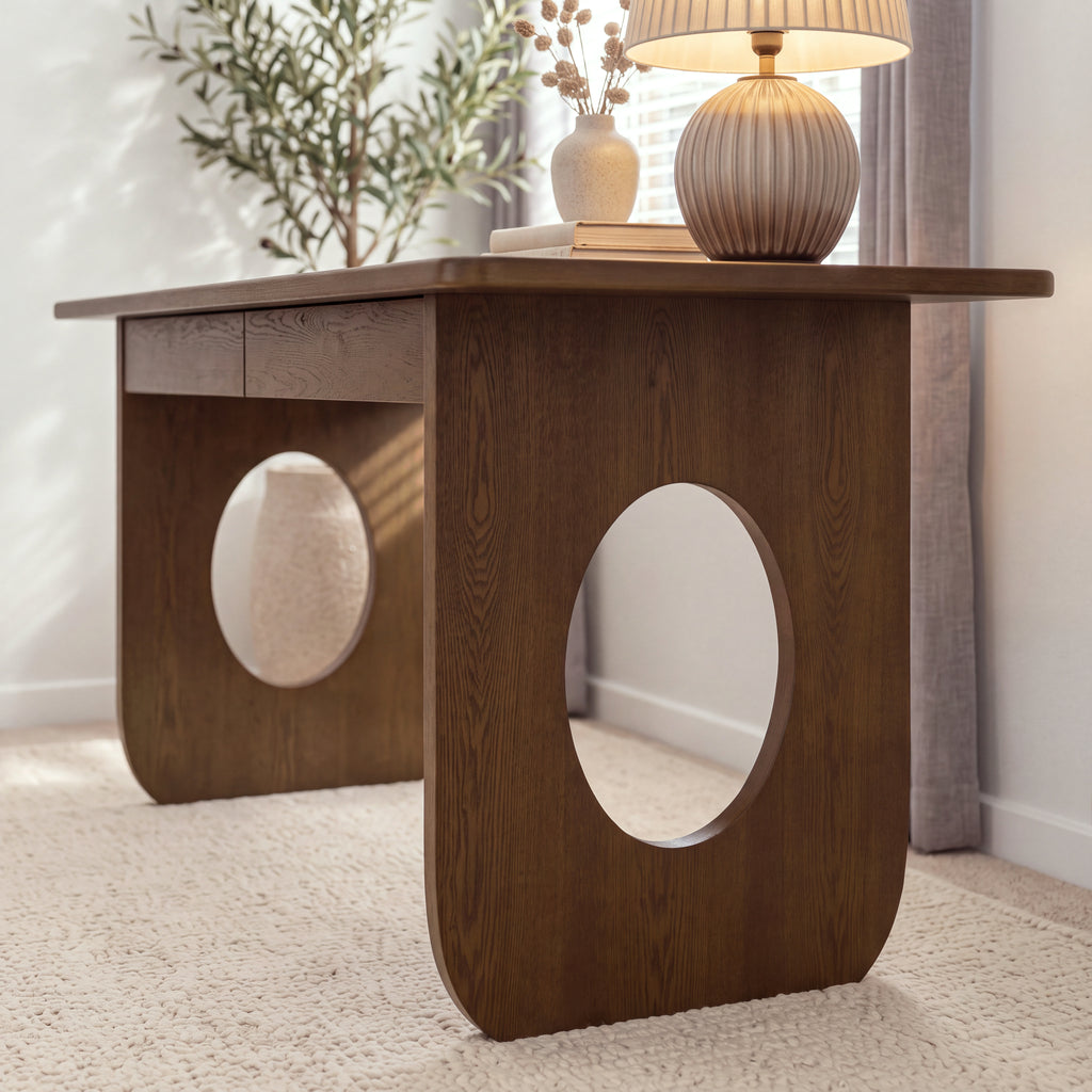 Elara 170cm Home Office Desk Walnut, close-up of an oval cut-out leg panel and the rounded top edge