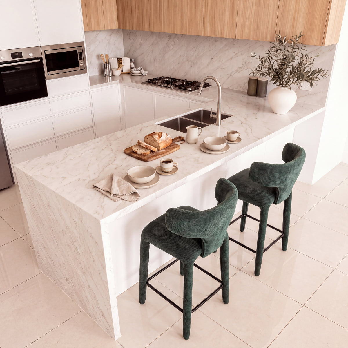 Emma 2pc Set Bar Chair Barstool Green, at a kitchen island with a serving board, raised view