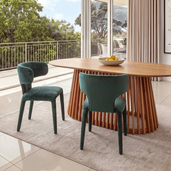 Emma 2pc Set Dining Chair Green, at a timber dining table with a slatted pedestal