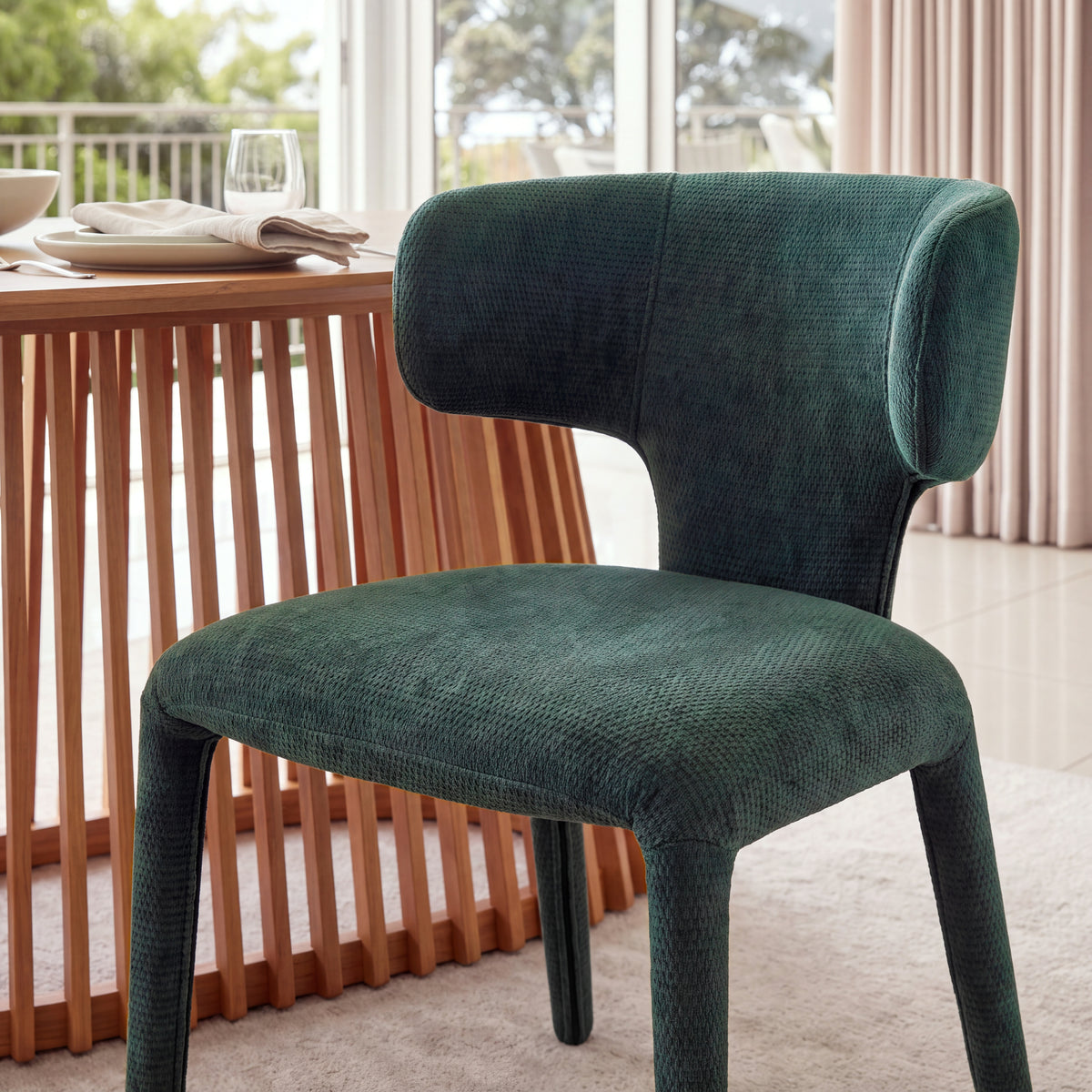 Emma 2pc Set Dining Chair Green, close-up of the seat and curved backrest