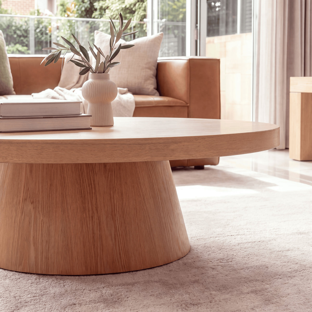 Erina 110cm Round Coffee Table Natural Oak, close-up of the pedestal base