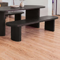 Eve 198cm Dining Bench Black beside a matching oval dining table in a bright dining room