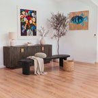 Eve 198cm Dining Bench Black on its own in front of a reeded sideboard, with a linen throw, cushion and woven basket