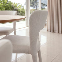 Frances 4pc Set Dining Chair Stackable Beige, close-up of the curved backrest and seat