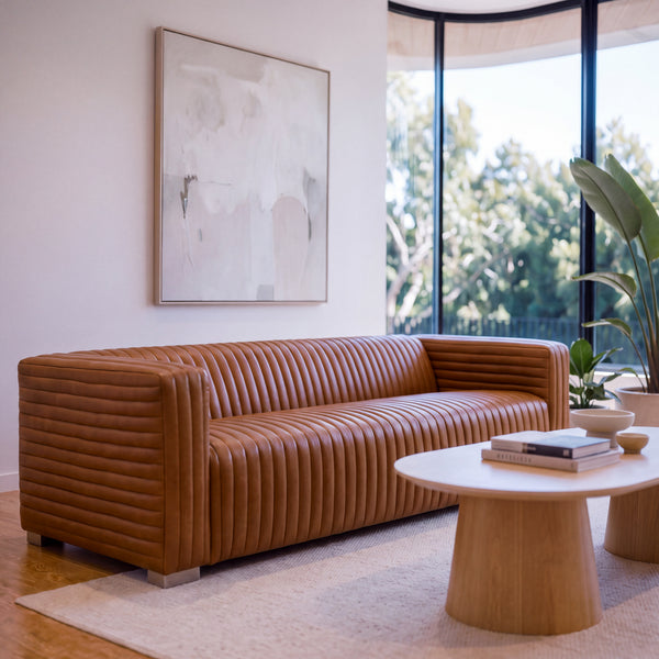 Grandior 3 Seater Sofa Tan, styled in a living room, front three-quarter view