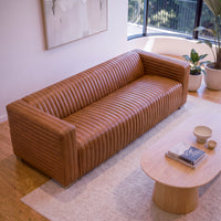 Grandior 3 Seater Sofa Tan, styled in a living room, overhead view