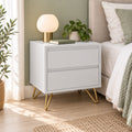Hawea 2 Drawer Bedside Table White, beside a bed with a lamp and a plant on top