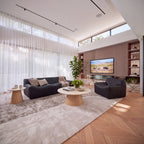 Hera 100cm Round Coffee Table Natural, in a living room, wide view