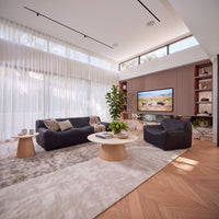 Hera 100cm Round Coffee Table Natural, in a living room, wide view