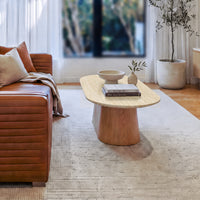 Hera 130cm Coffee Table Natural, close three-quarter view styled with books and a vase