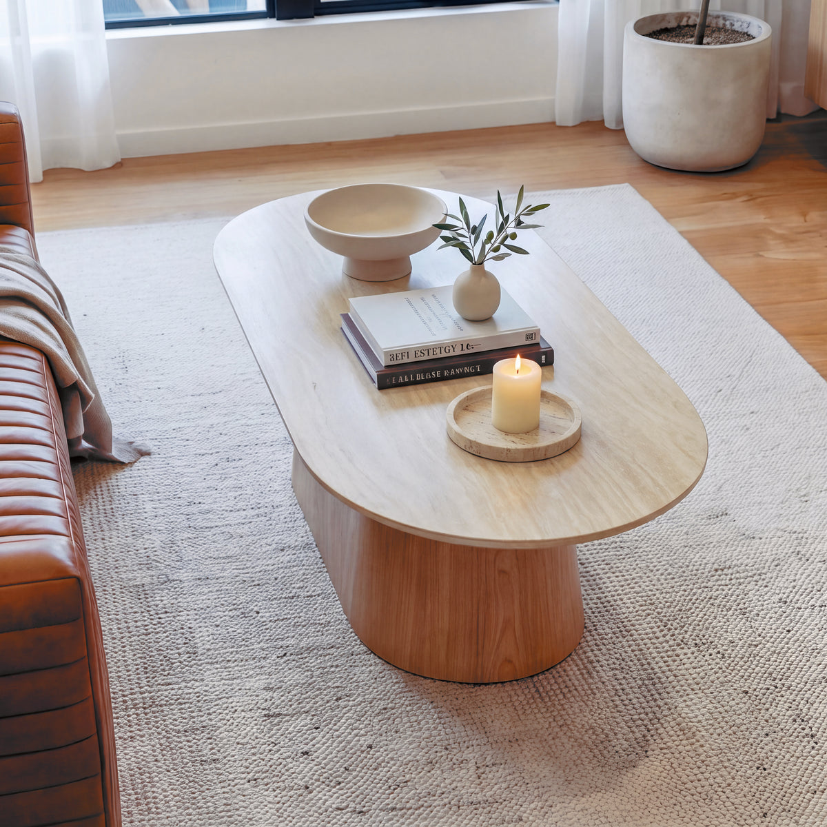Hera 130cm Coffee Table Natural, overhead view styled with books and a candle