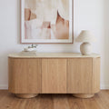 Hera 180cm Sideboard Buffet Table Natural, styled with artwork and a table lamp, front view