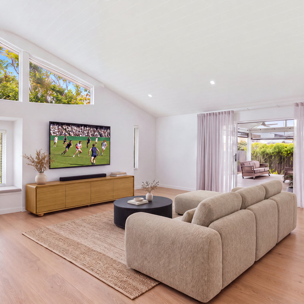 Hudson Jenny 220cm ETU Entertainment TV Unit Natural in a living room with high windows, a sofa and a round coffee table, wide view