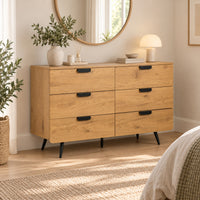 Jinan 120cm Dresser Chest of 6 Drawers Oak, in a bedroom beneath a round mirror