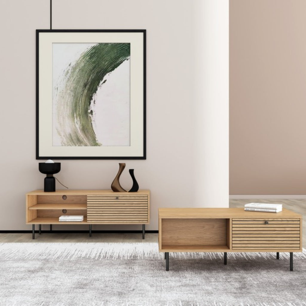Line 100cm Coffee Table Oak and Black, in a living room beside a matching TV unit