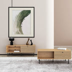 Line 100cm Coffee Table Oak and Black, in a living room beside a matching TV unit