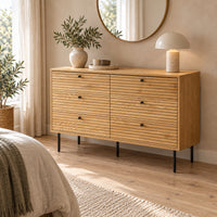 Line 120cm Dresser Chest of 6 Drawers Oak and Black, in a bedroom beneath a round mirror