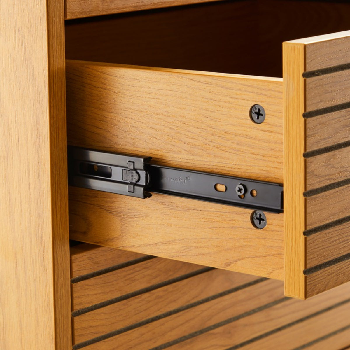 Line 50cm Tallboy Chest of 5 Drawers Oak and Black, close-up of the drawer runner