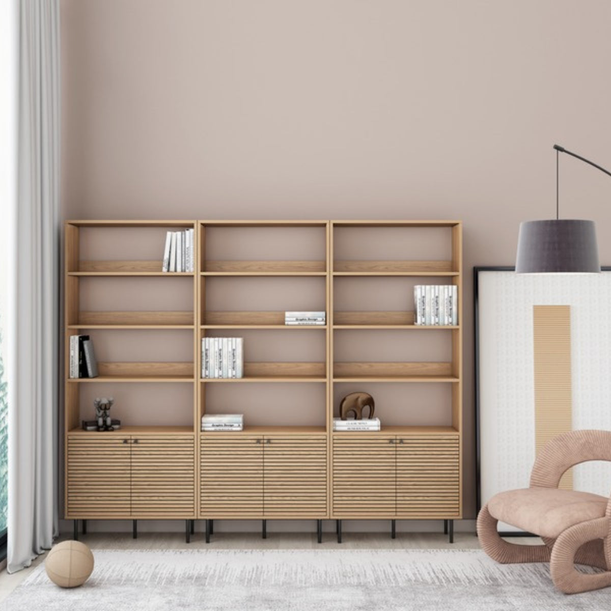 Line 80cm 2 Door Bookshelf Oak and Black, in a living room beside matching storage