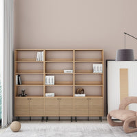 Line 80cm 2 Door Bookshelf Oak and Black, in a living room beside matching storage