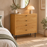 Line 80cm Tallboy Chest of 4 Drawers Oak and Black, in a bedroom beneath a round mirror