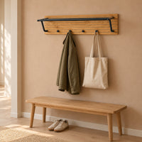 Line 80cm Wall Coat Rack with Shelf Oak and Black, in an entry hallway with a jacket and tote bag on its hooks