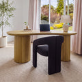 Marty 170cm Home Office Desk Natural in a study by a window with a dark upholstered chair, a laptop and a table lamp