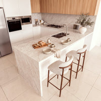 Ormond 2pc Set Bar Chair Barstool Fabric Seat Beige Walnut, at a kitchen island with a serving board, raised view