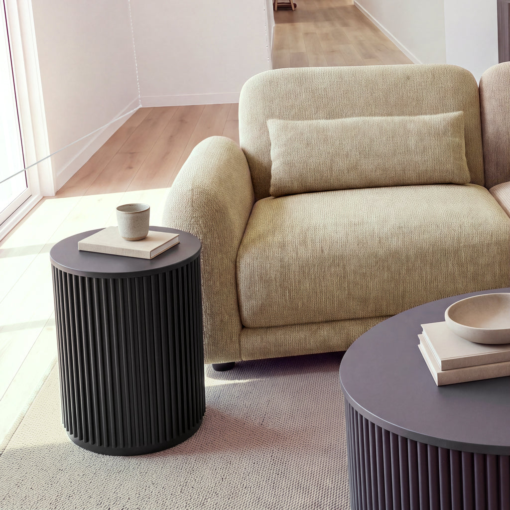 Paulie 270cm 3 Seater Modular Sofa with Ottoman Latte, close-up of the left arm, seat and lumbar cushion beside a round side table