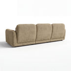 Paulie 270cm 3 Seater Modular Sofa with Ottoman Latte, rear three-quarter view on a white background showing the three back panels