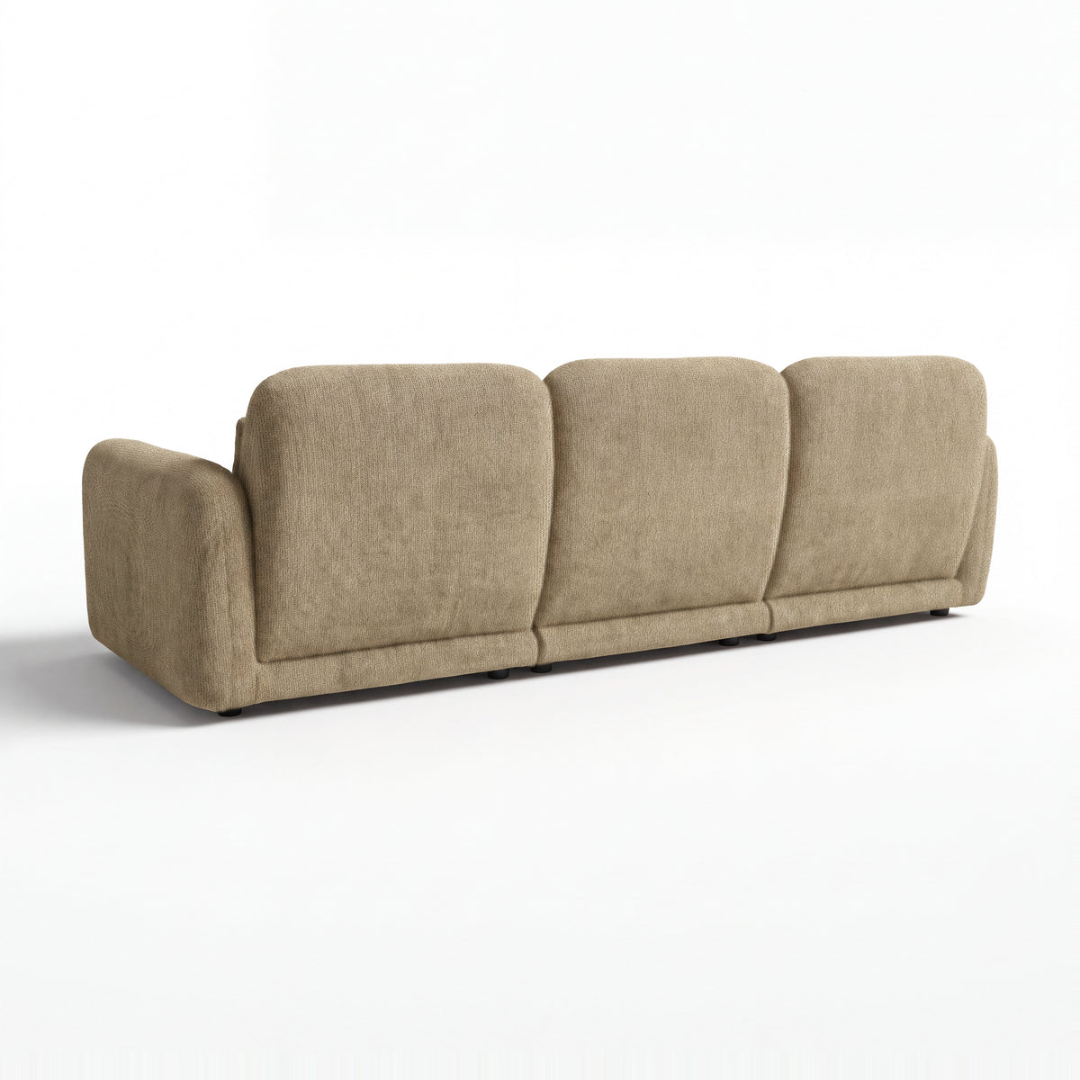 Paulie 270cm 3 Seater Modular Sofa with Ottoman Latte, rear three-quarter view on a white background showing the three back panels