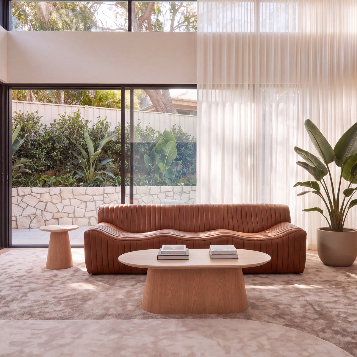 Ripley 3 Seater Sofa Tan, styled in a living room, reverse angle