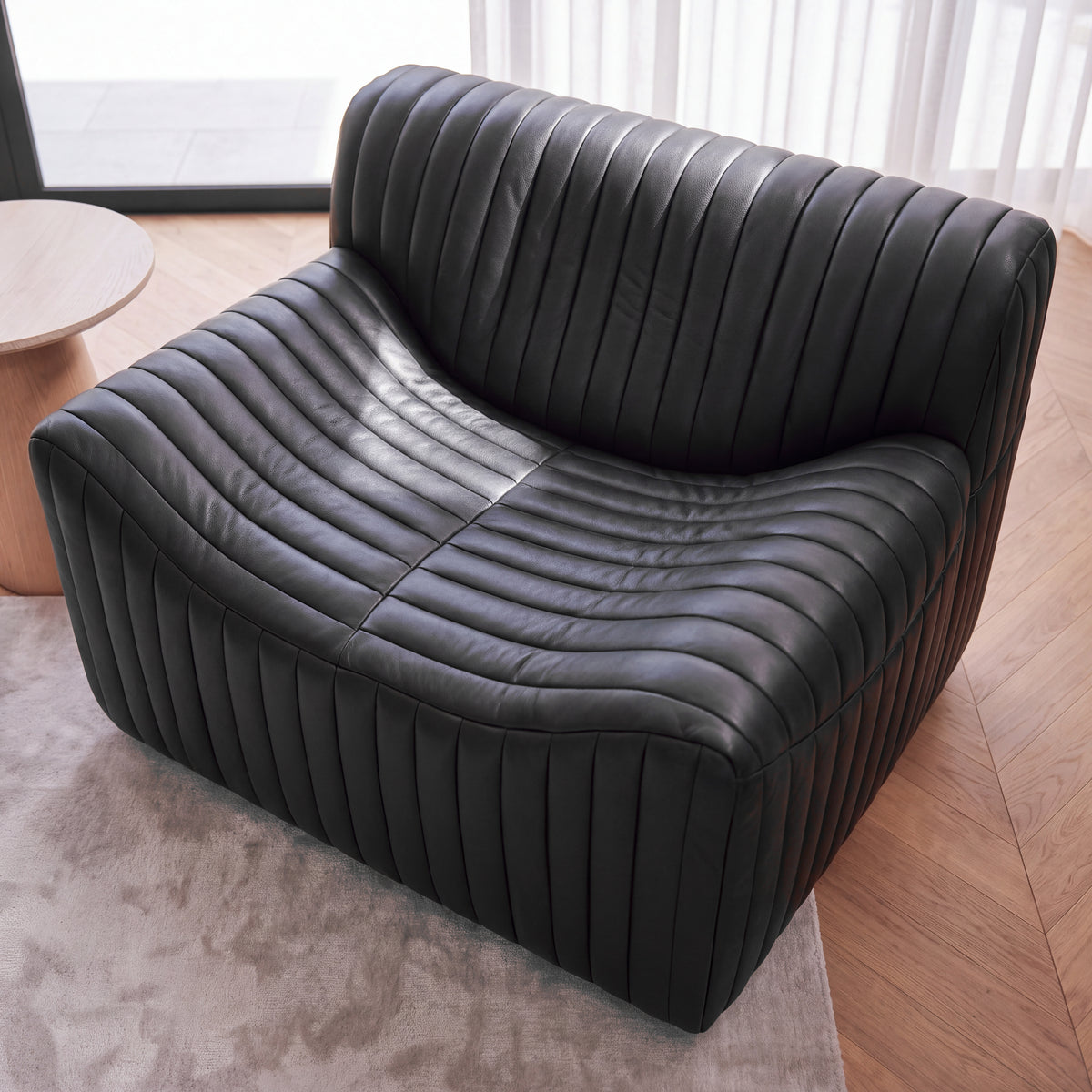 Ripley Single Seater Armchair Sofa Black, styled in a living room, overhead view