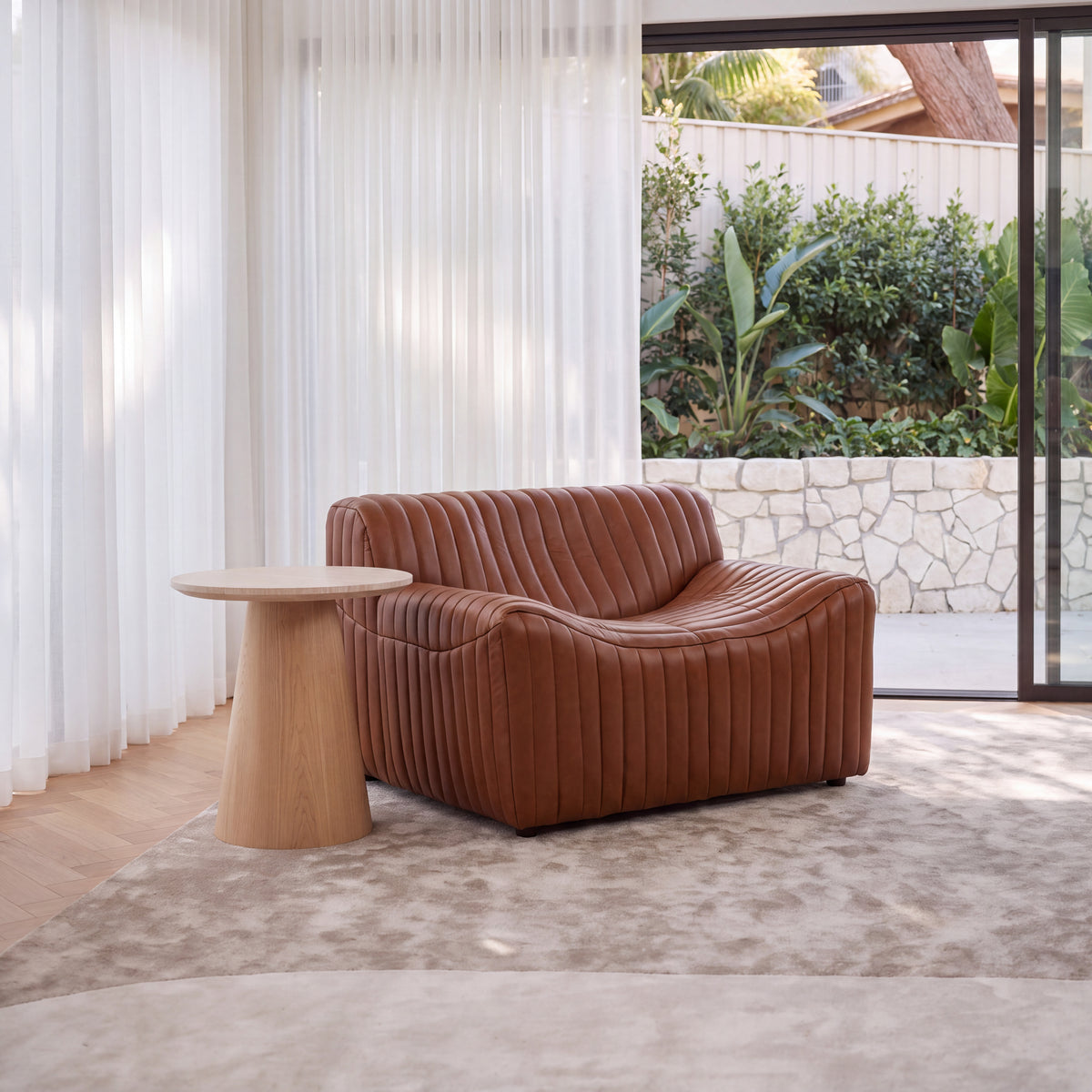 Ripley Single Seater Armchair Sofa Tan, styled in a living room, front three-quarter view
