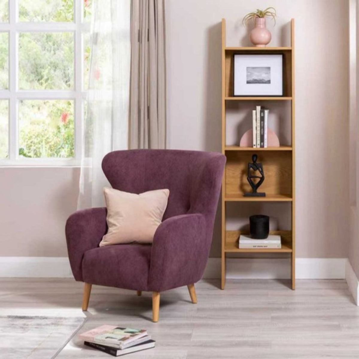 Scala 50cm Bookshelf Oak, in a living room beside a velvet armchair