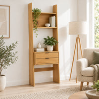 Scala 60cm 2 Drawer Bookshelf Oak, in a living room beside an armchair and floor lamp