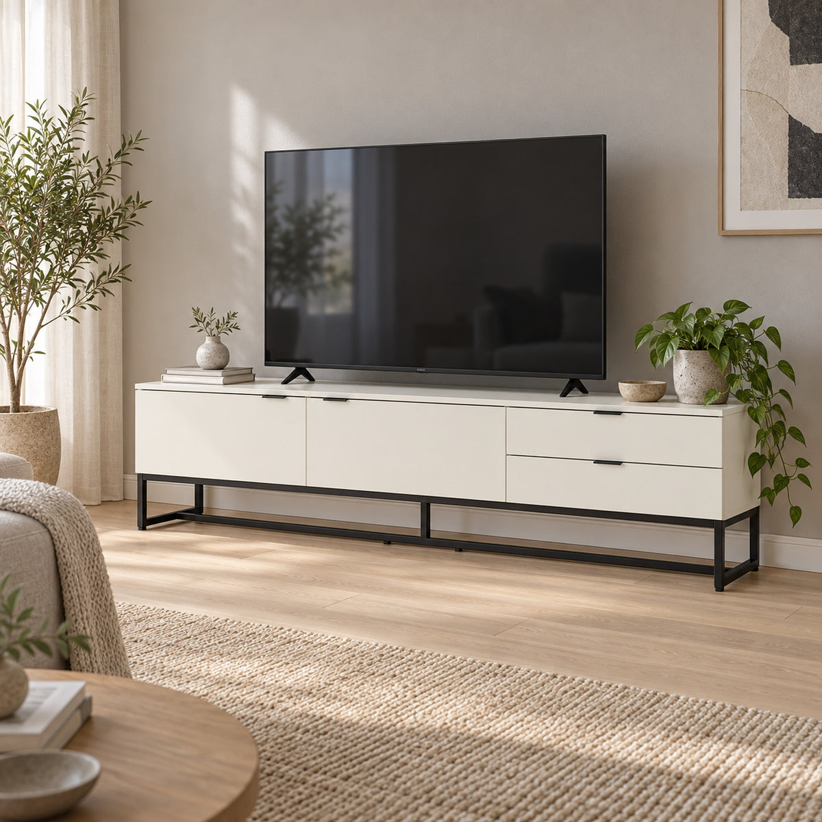 Svana 180cm ETU Entertainment TV Unit White, in a living room with a TV on top