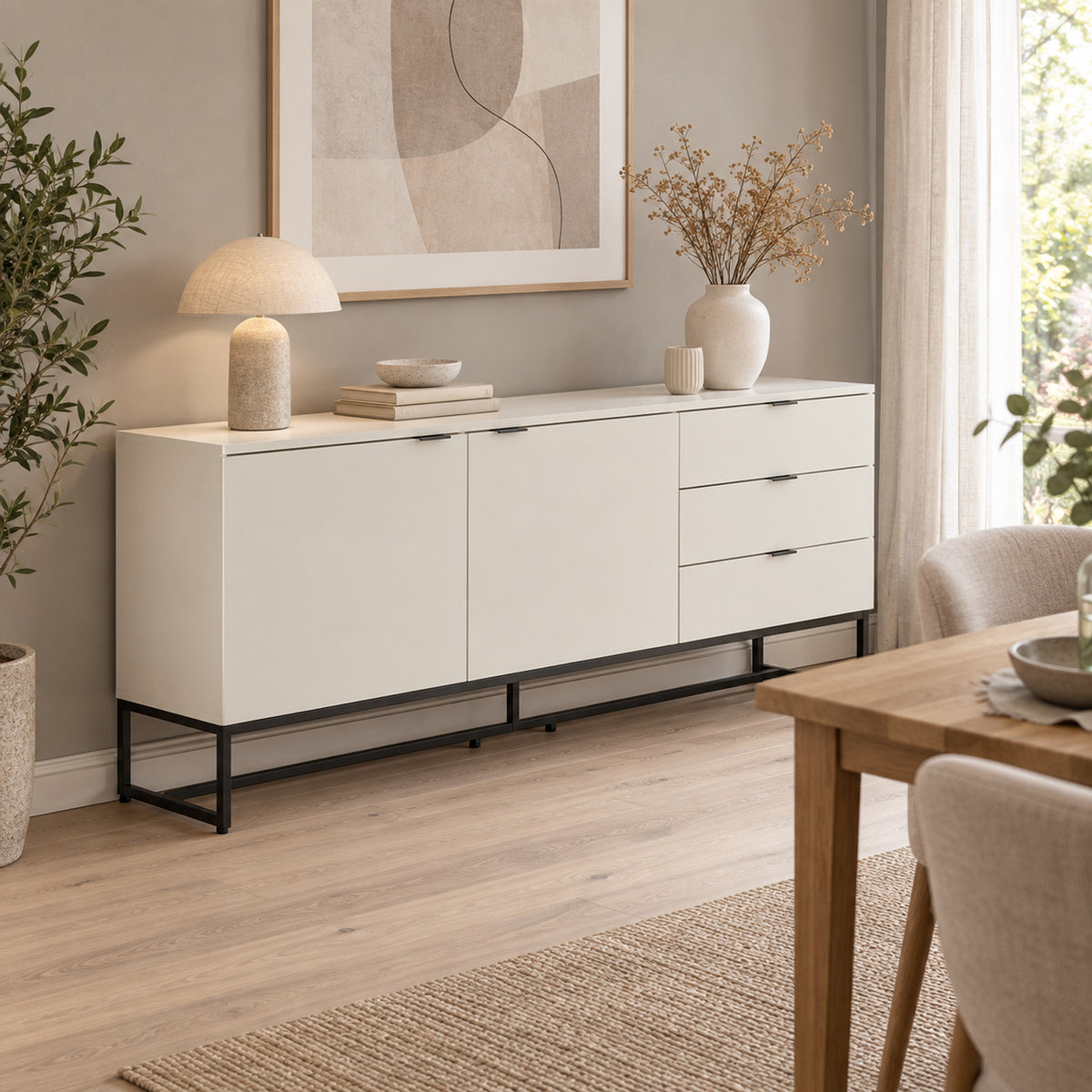Svana 180cm Sideboard Buffet Table White, in a dining area beneath a framed print