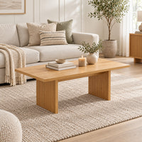 Thomasville 120cm Coffee Table Oak, in front of a sofa in a living room