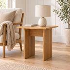 Thomasville 50cm Side Table Oak, beside an armchair with a table lamp on top