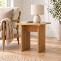 Thomasville 50cm Side Table Oak, beside an armchair with a table lamp on top