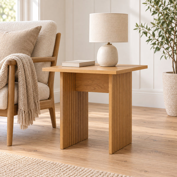 Thomasville 50cm Side Table Oak, beside an armchair with a table lamp on top