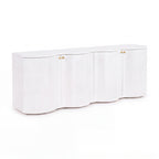 Wave 215cm white four-door buffet with a curved wave front and brass knobs, angled view on a white background