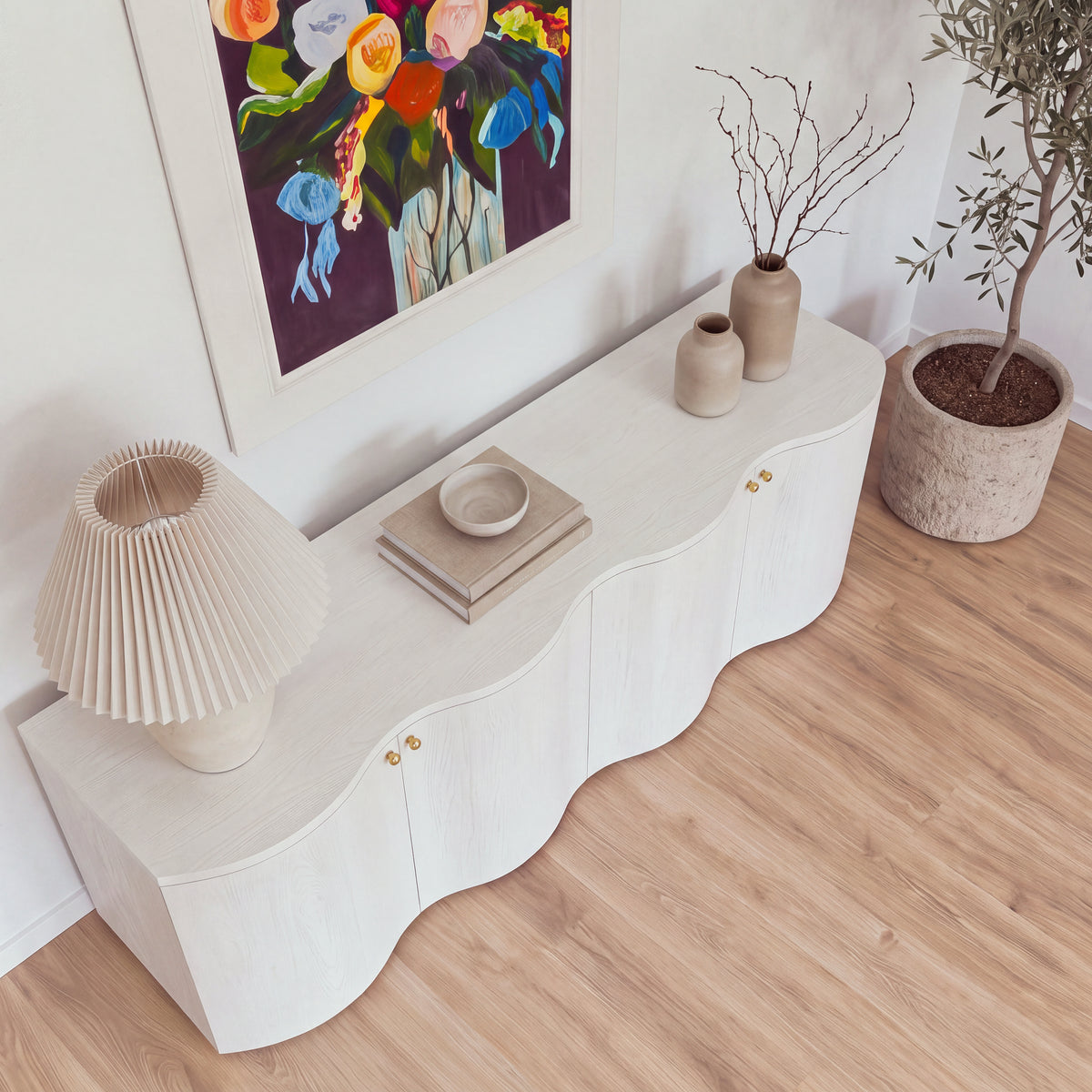 Wave white buffet seen from above, showing its curved wave top and styled decor