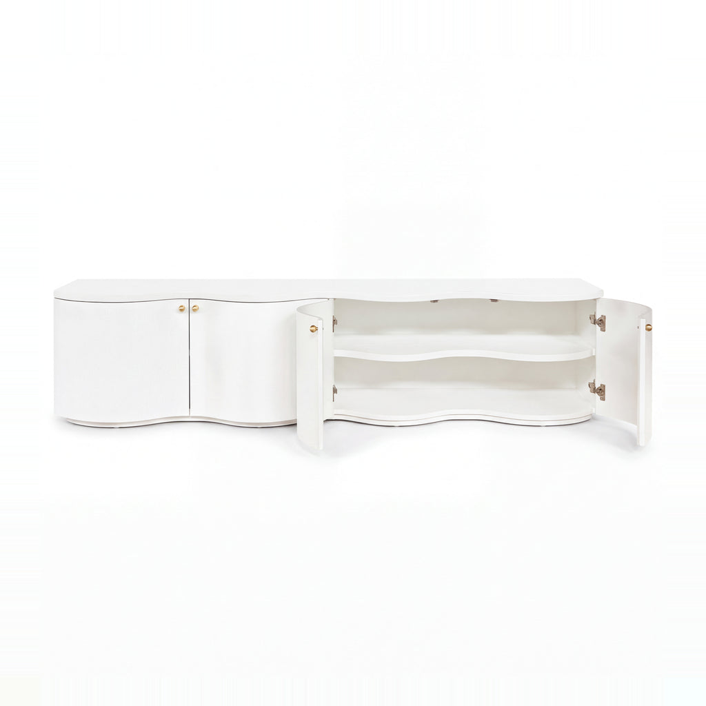 Wave white entertainment unit with doors open on a white background, showing the interior shelf