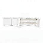Wave white entertainment unit with doors open on a white background, showing the interior shelf